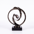 Interwoven Swirl With Central Glass Orb Decorative Piece