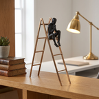 modern-figurative-sculpture-black-gold-shelf-decor